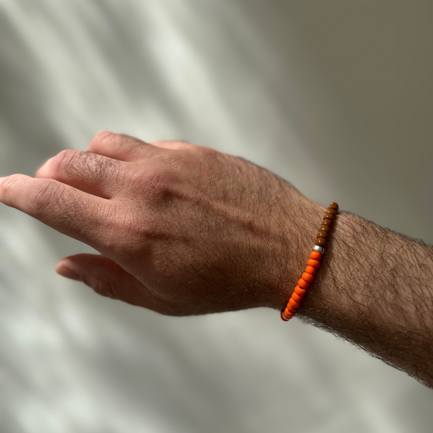 One Silver / Orange & Brown Glass