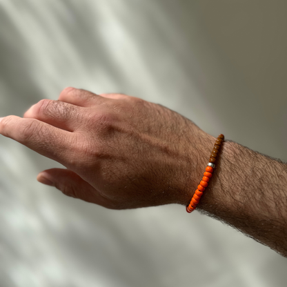 One Silver / Orange & Brown Glass