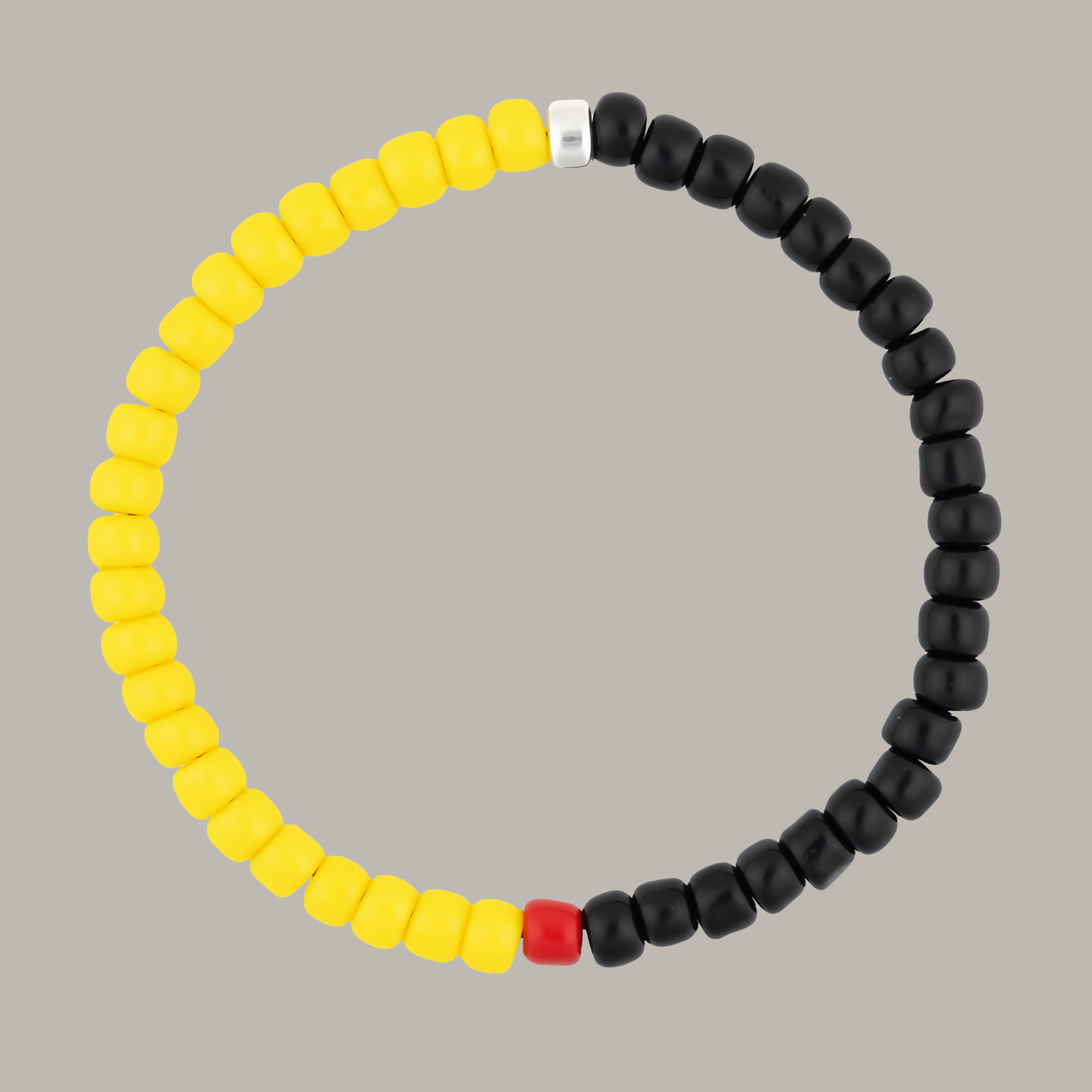 One Silver / Black & Yellow Glass